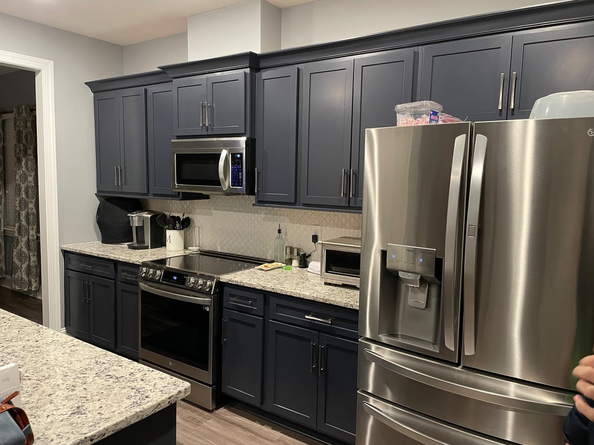 Navy shaker cabinets, smooth and durable by Carolina Superior Painting LLC, Clayton