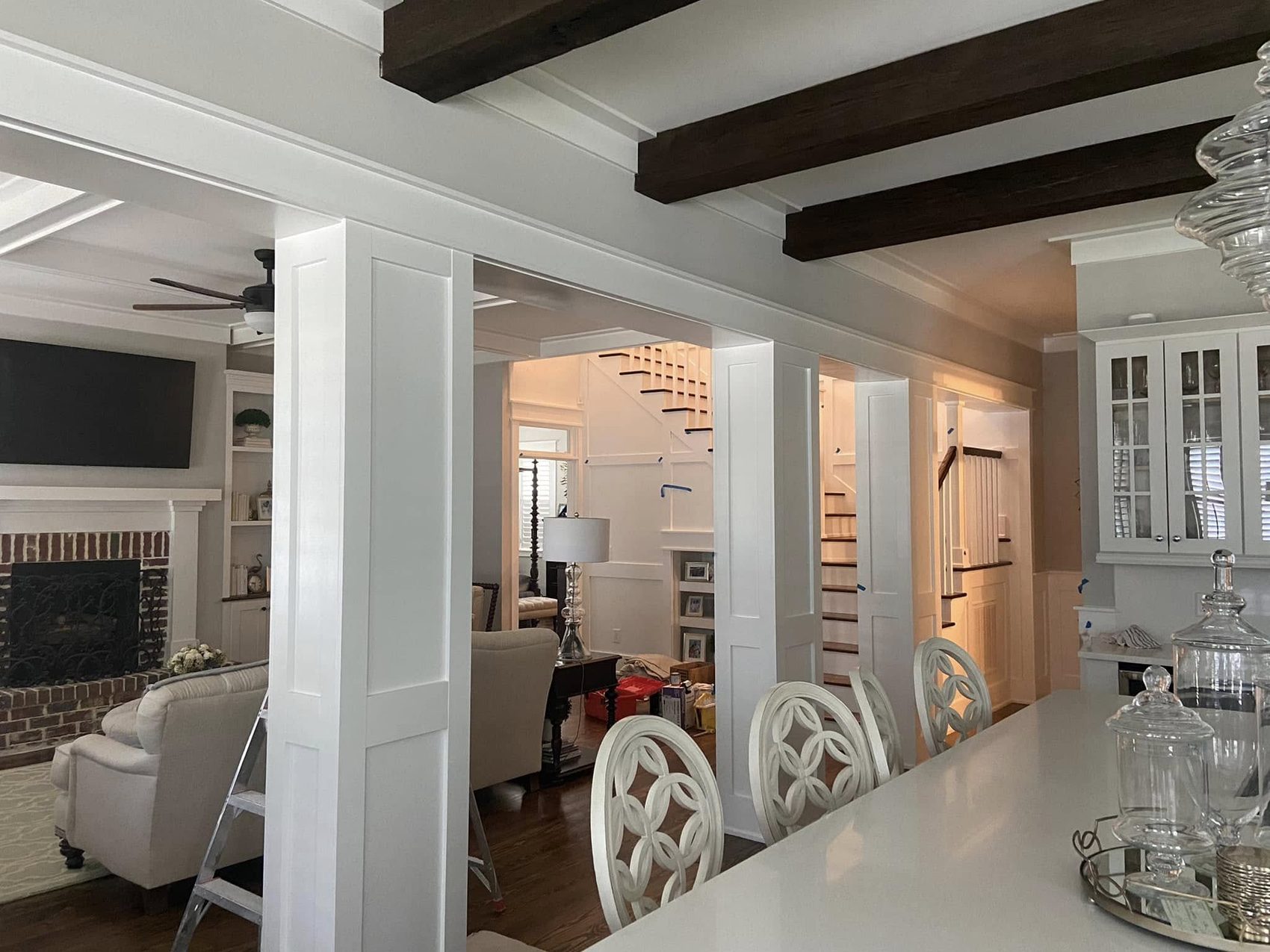 Open plan painted around the beams by Carolina Superior Painting LLC