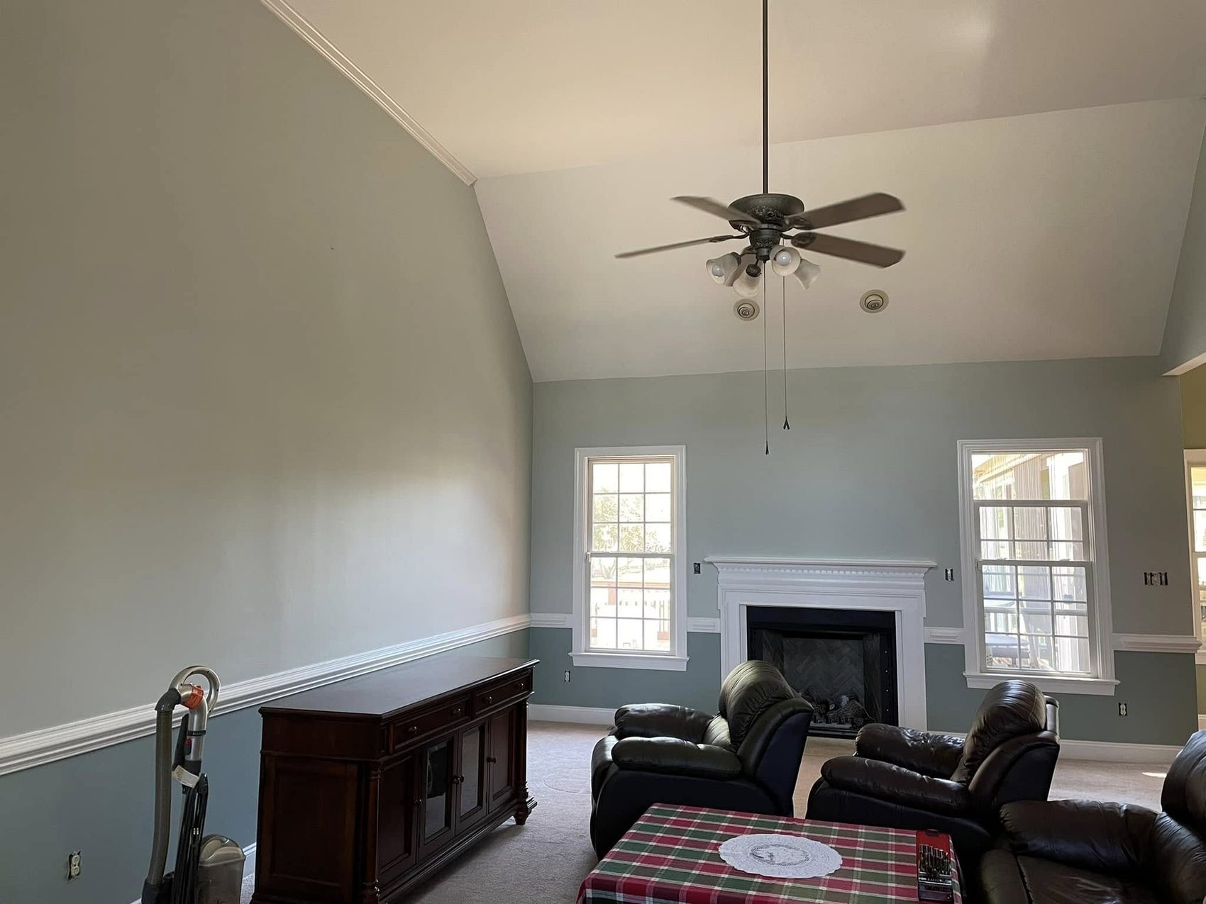 Living room walls in warm grey by Carolina Superior Painting LLC
