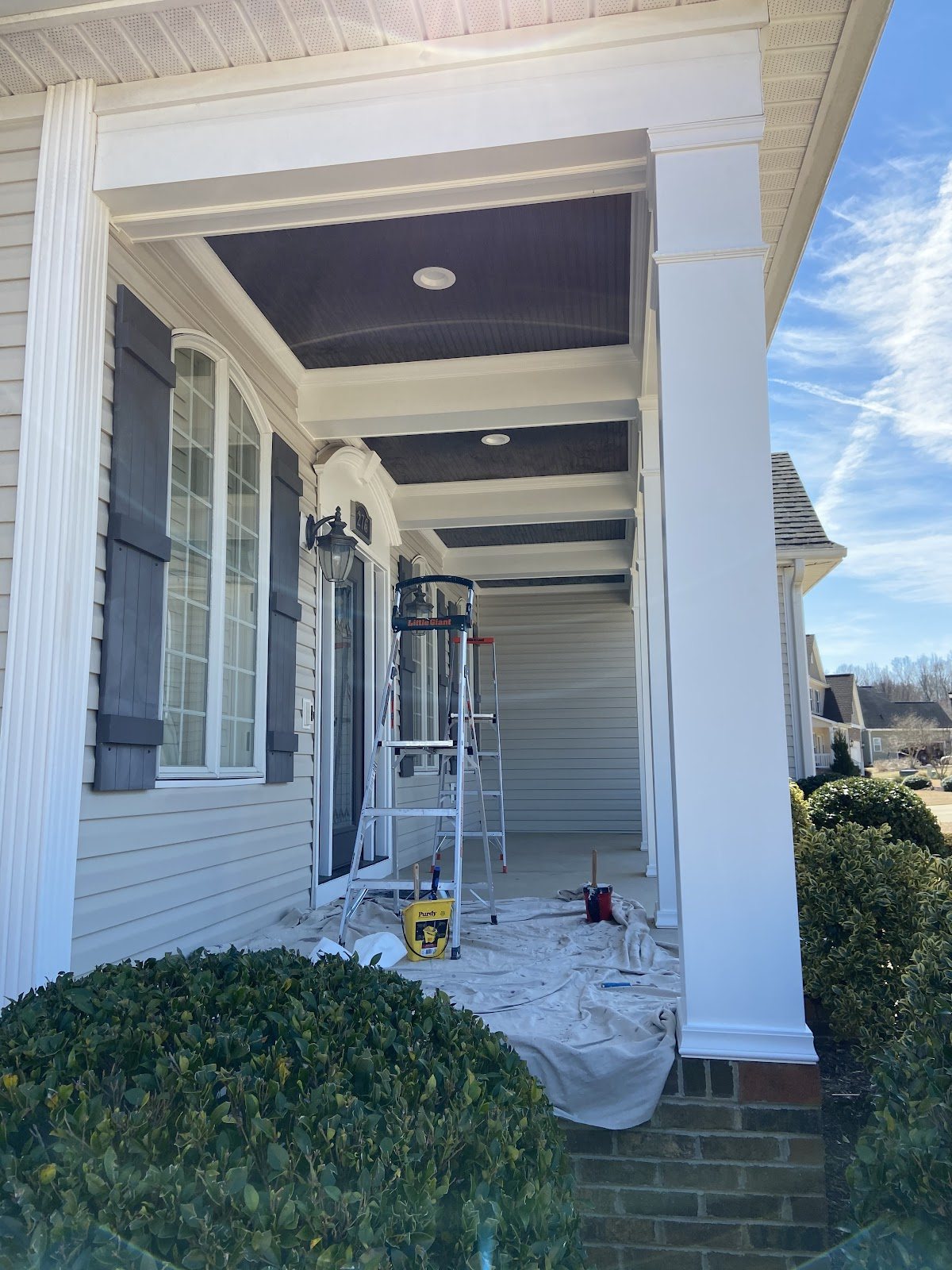 Porch ceiling and columns, masked before a coat by Carolina Superior Painting LLC